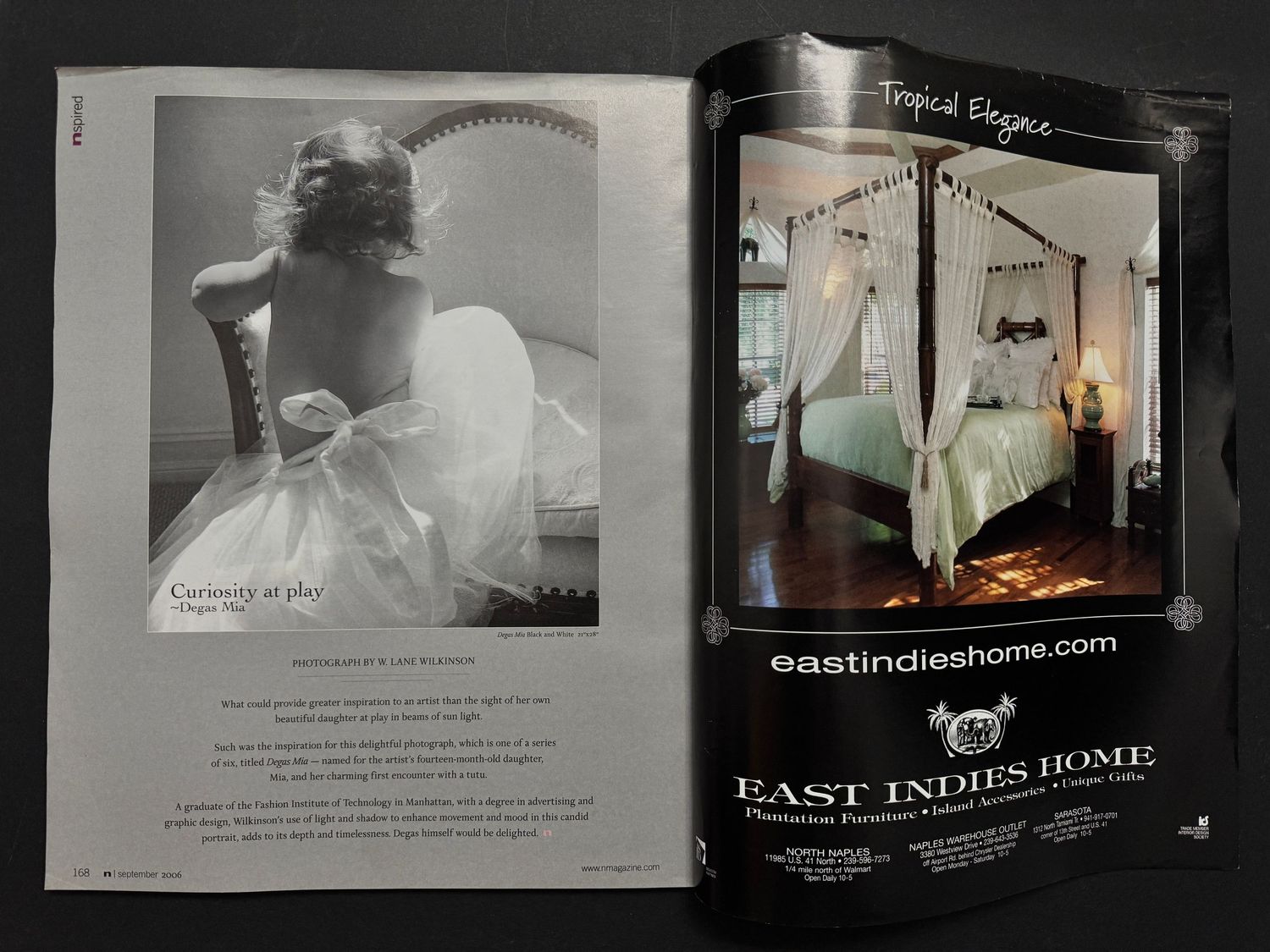 Open magazine spread showing a fashion photo on left and East Indies Home tropical bedroom furniture advertisement on right.