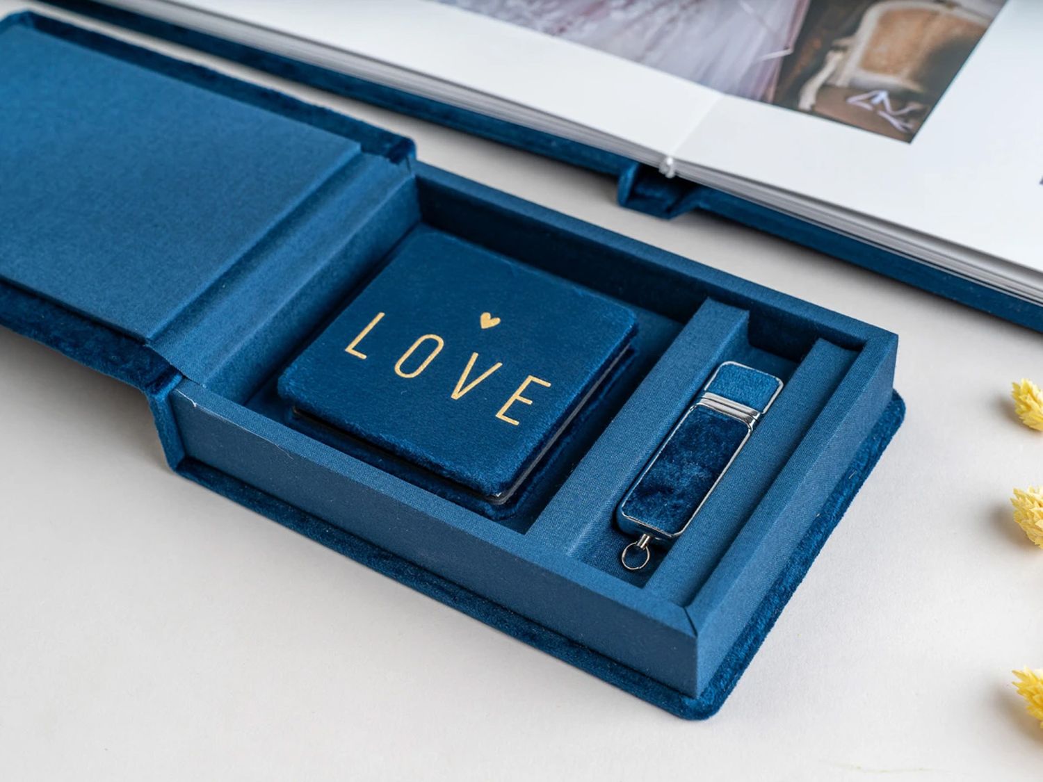 Blue velvet gift box with LOVE book, USB drive, and photo album, perfect for wedding memories. Northern ireland weddings