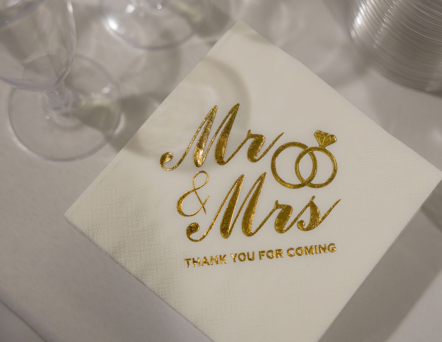 White wedding napkin with gold foil Mr. & Mrs. and Thank You For Coming text, perfect for wedding receptions.