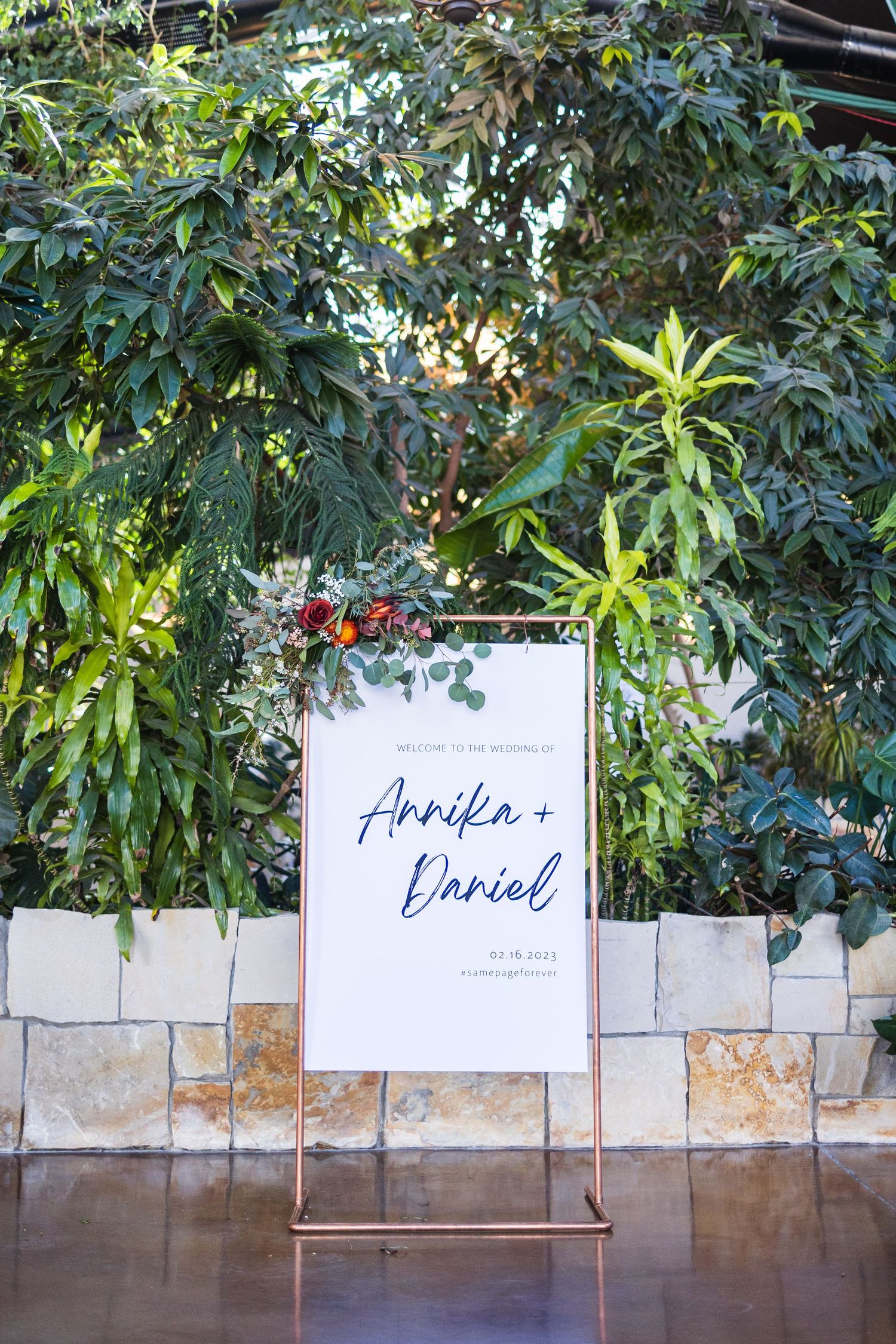 Wedding welcome sign for Annika and Daniel outdoors.