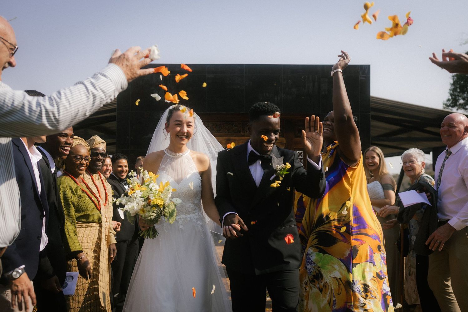 Wedding photography by Crimson and Vow showing a bride and groom hugging at a scenic wedding venue in George, Garden Route.