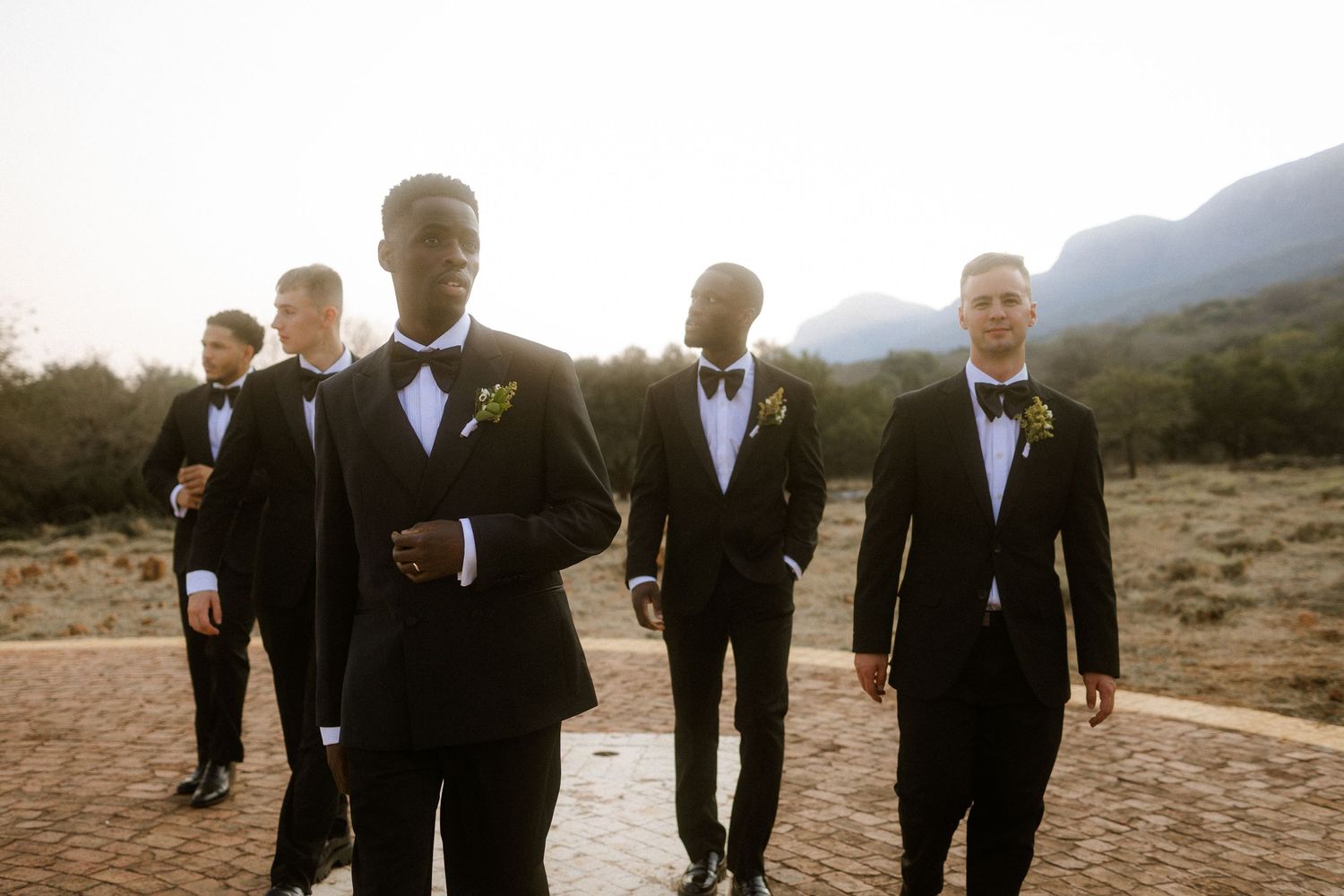 Wedding photography by Crimson and Vow showing a bride and groom hugging at a scenic wedding venue in George, Garden Route.