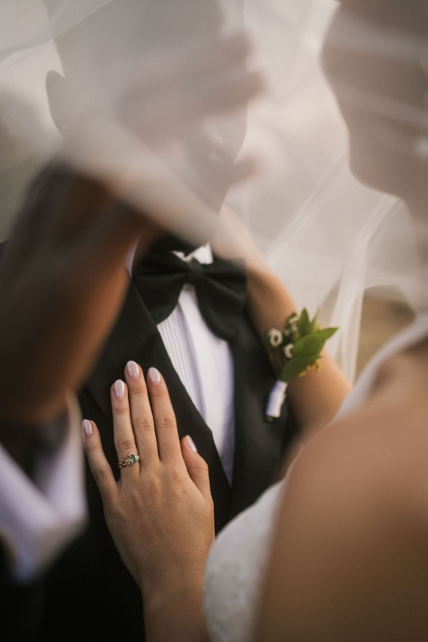 Wedding photography by Crimson and Vow showing a bride and groom hugging at a scenic wedding venue in George, Garden Route.
