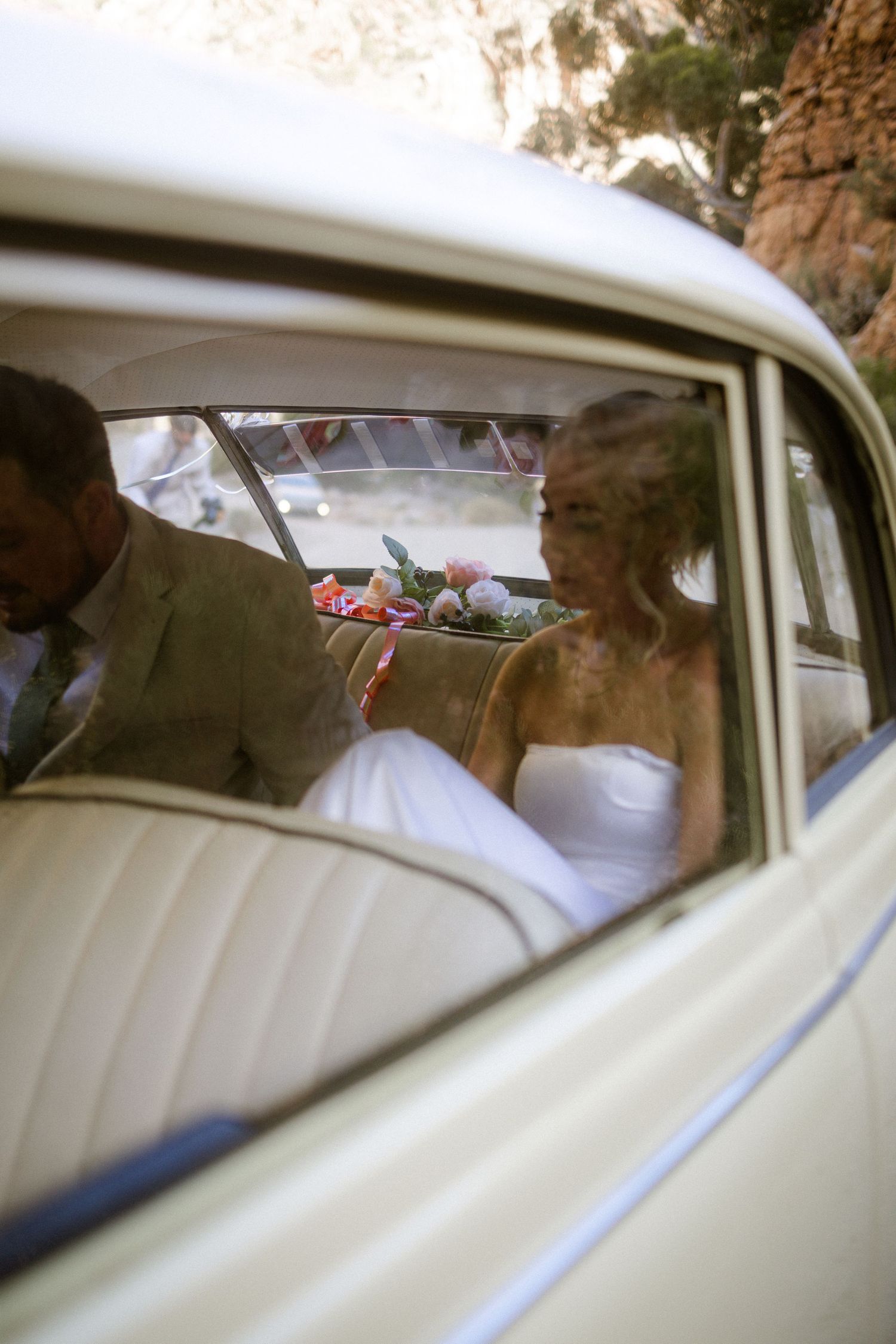 Candid wedding photo by Crimson and Vow of laughing bridesmaids in the forest in Knysna, Garden Route