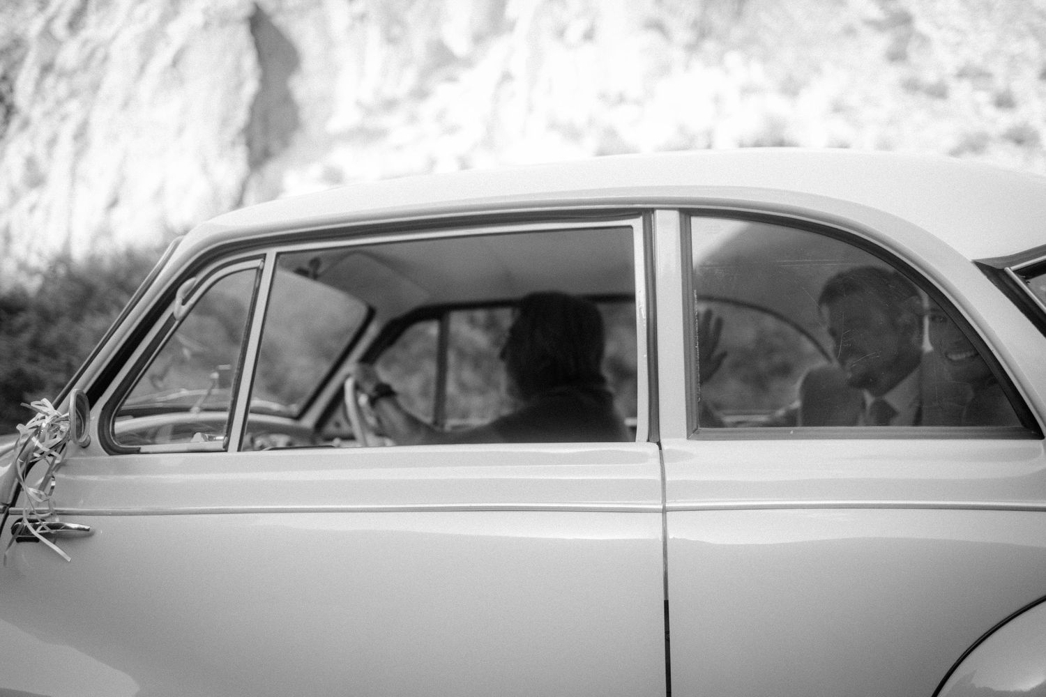 Candid wedding photo by Crimson and Vow of laughing bridesmaids in the forest in Knysna, Garden Route