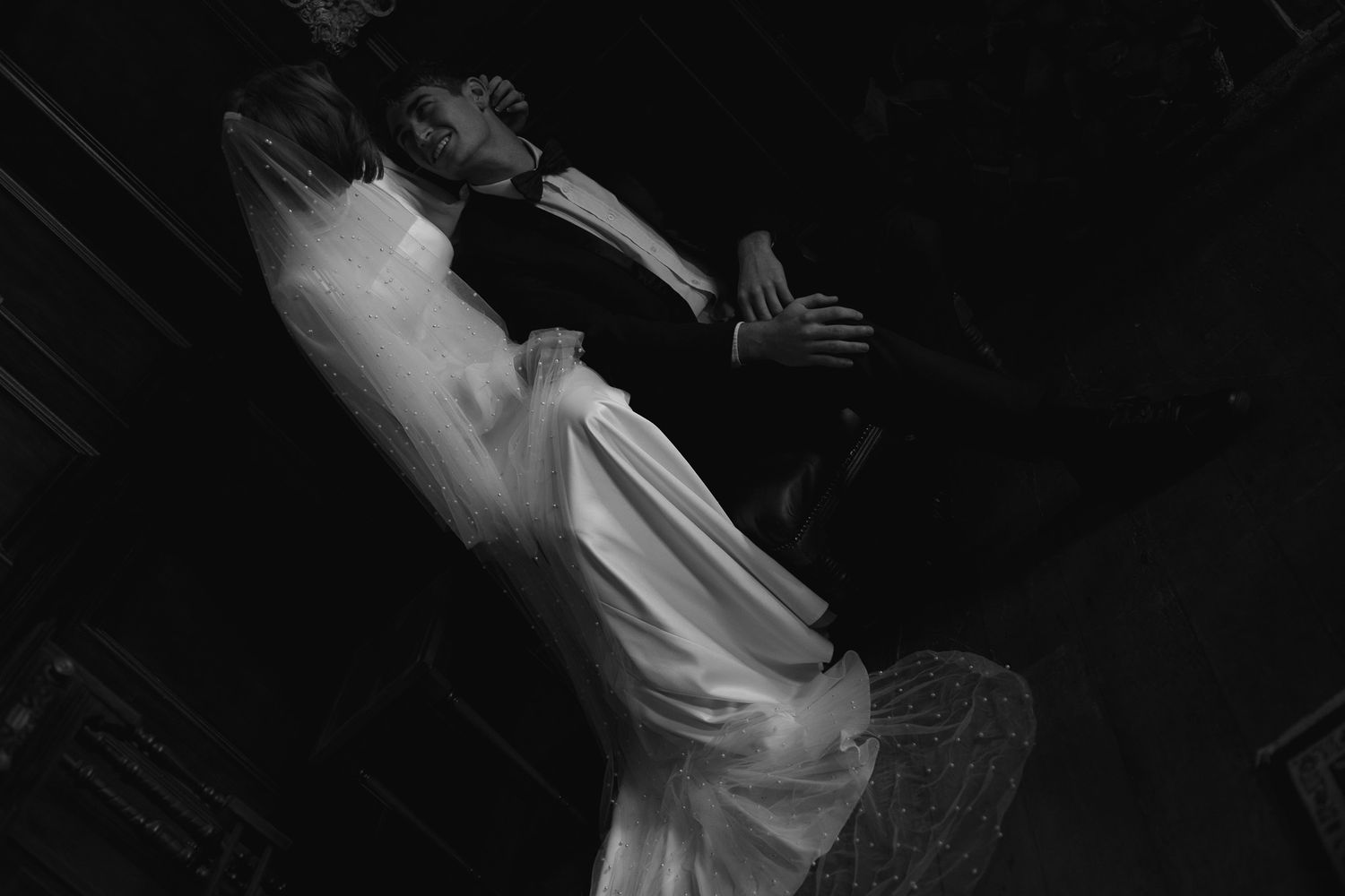 Wedding photography by Crimson and Vow showing a bride and groom hugging at a scenic wedding venue in George, Garden Route.
