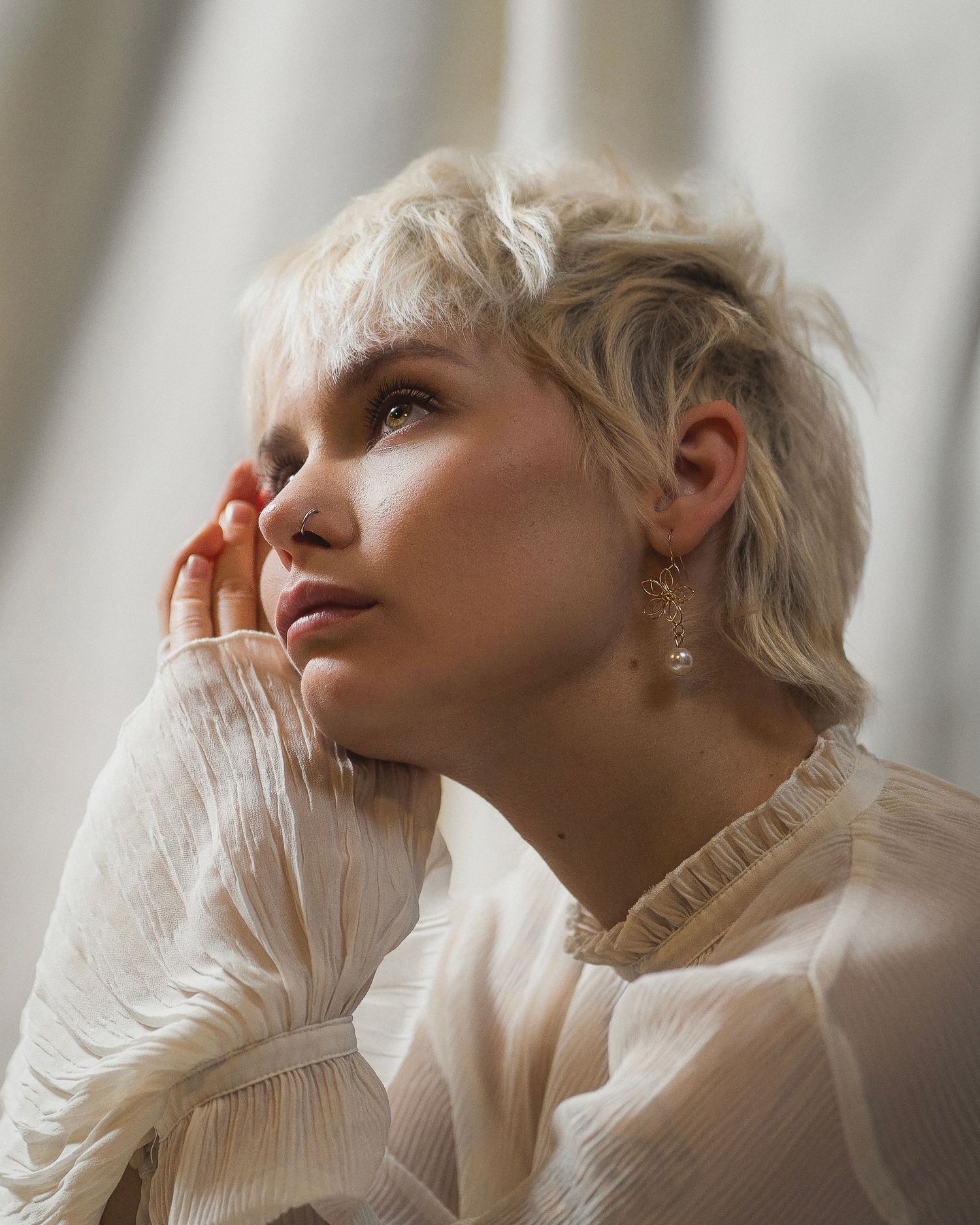 Editorial Female Portrait by Photographer Arthur Hall. 
Golden glow colours. Divine. Studio Portrait.