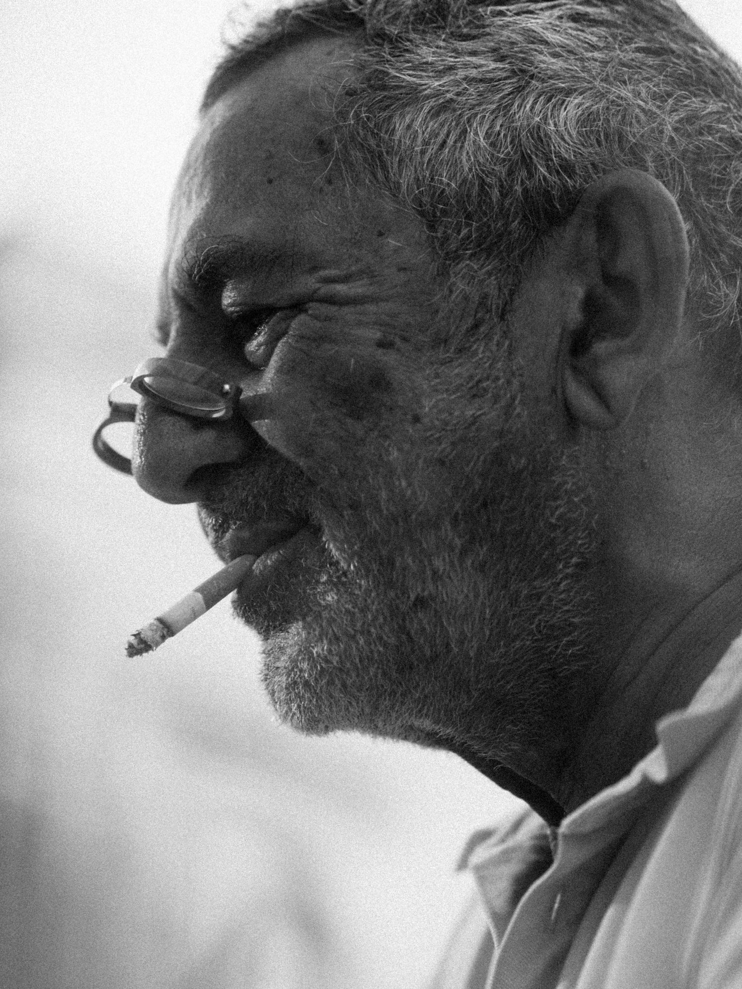 Documentary Male Portrait by Photographer Arthur Hall. 
Puglia, Italy, Italian Artisan, Male Portrait, craftsman, BW, monochrome, smoke