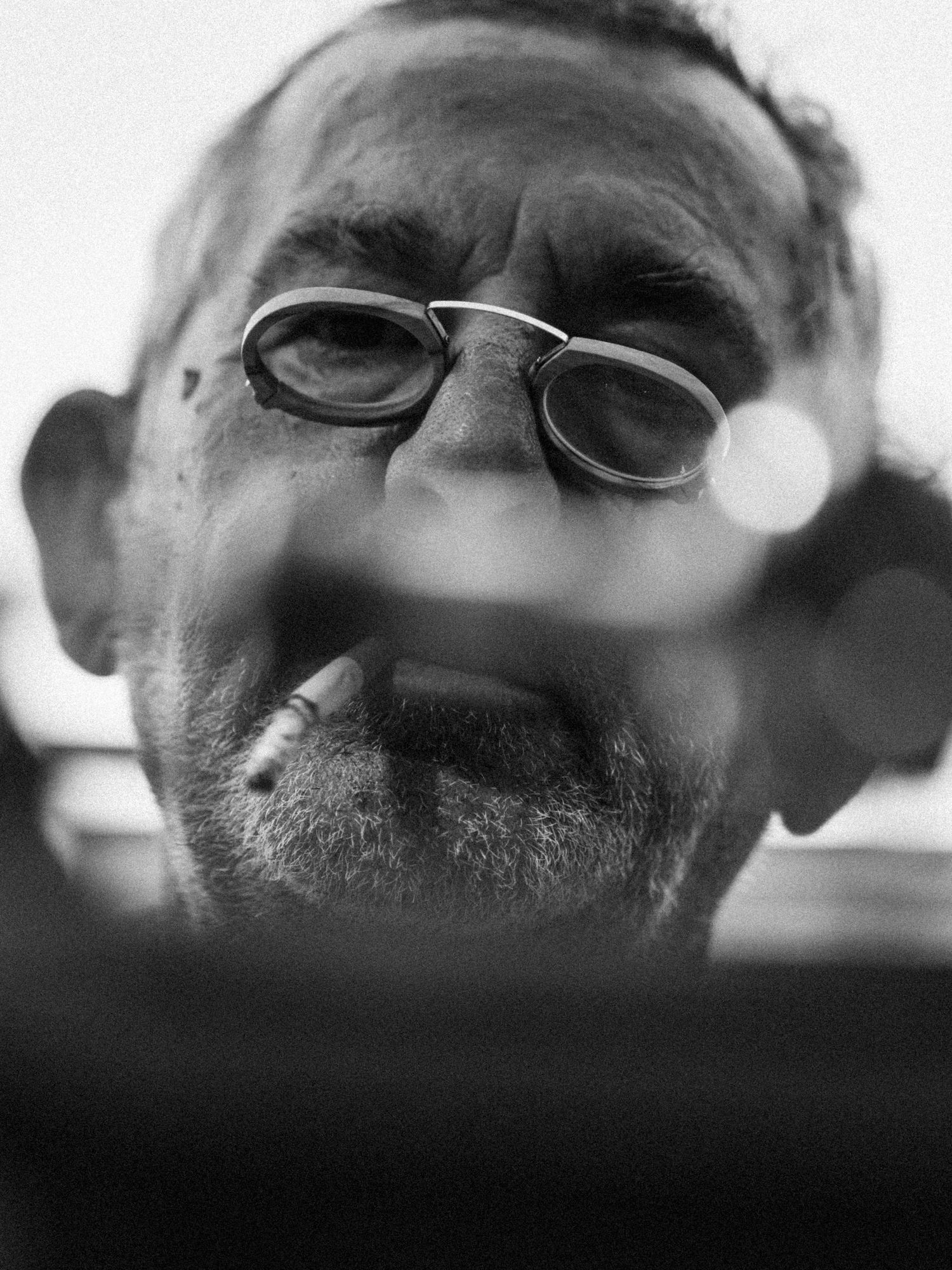 Documentary Male Portrait by Photographer Arthur Hall. 
Puglia, Italy, Italian Artisan, Male Portrait, craftsman, BW, monochrome, smoke