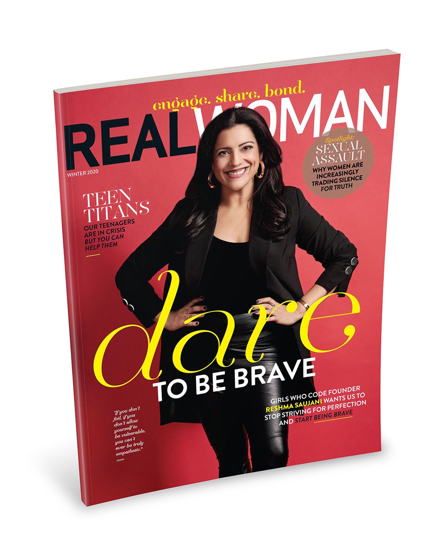 Real Woman magazine winter 2025 cover featuring a smiling woman in black, with bold text reading Dare to Be Brave.