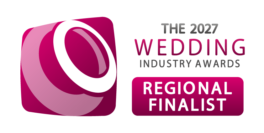 The 2027 Wedding Industry Awards Regional Finalist badge featuring a pink and white logo design.