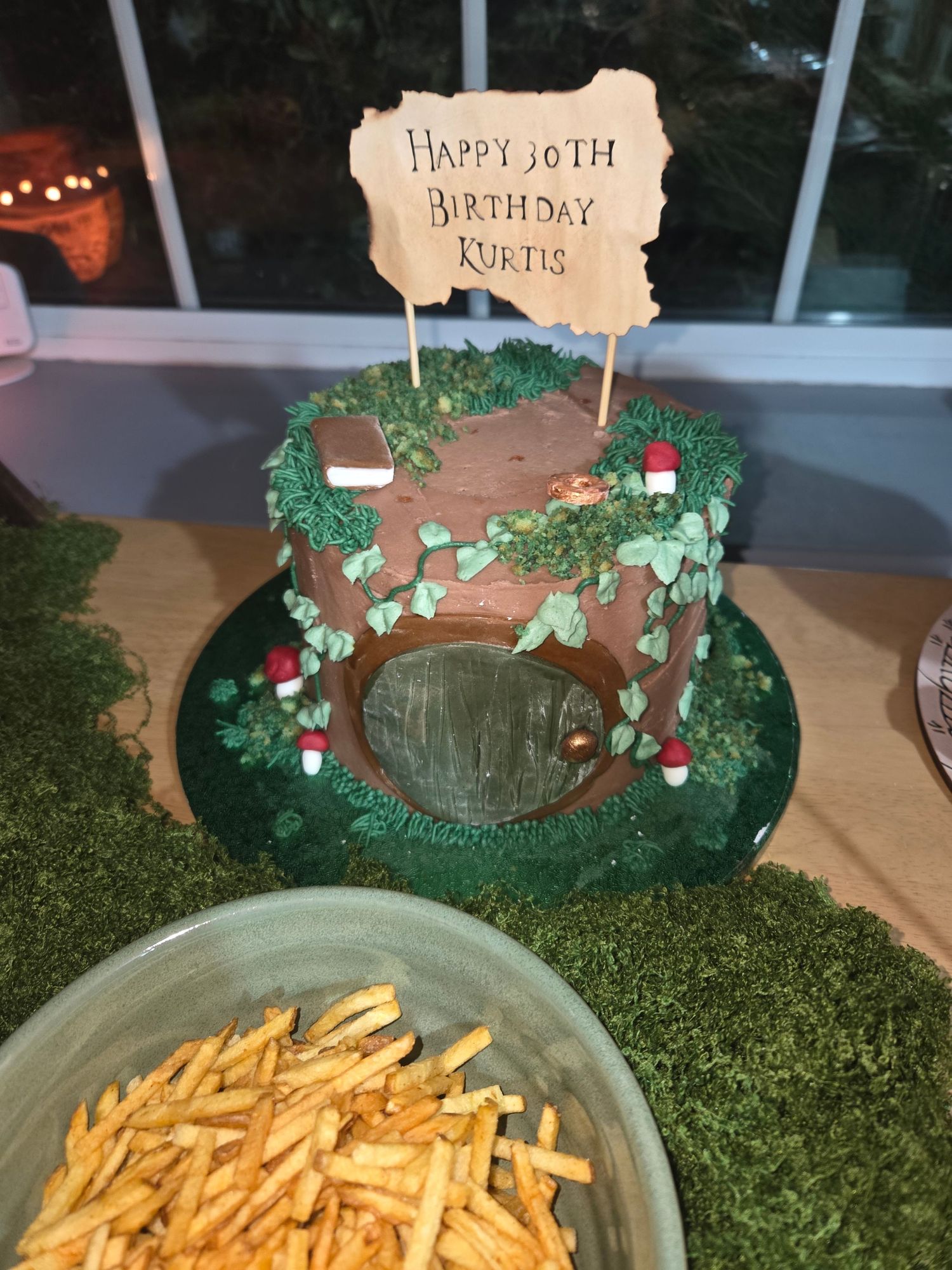 Hobbit hole themed birthday cake decorated with moss and mushrooms for Kurtis 30th birthday.