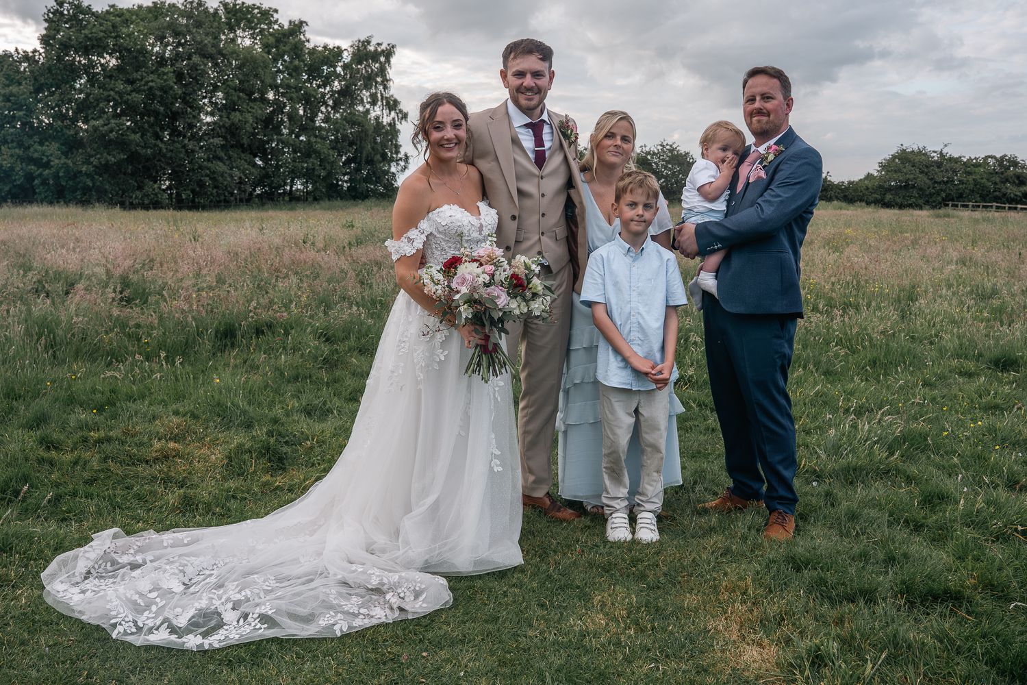 Group photograph taken during the reception at The barn at Willerby, East Yorkshire, Taken by an East Yorkshire wedding photographer