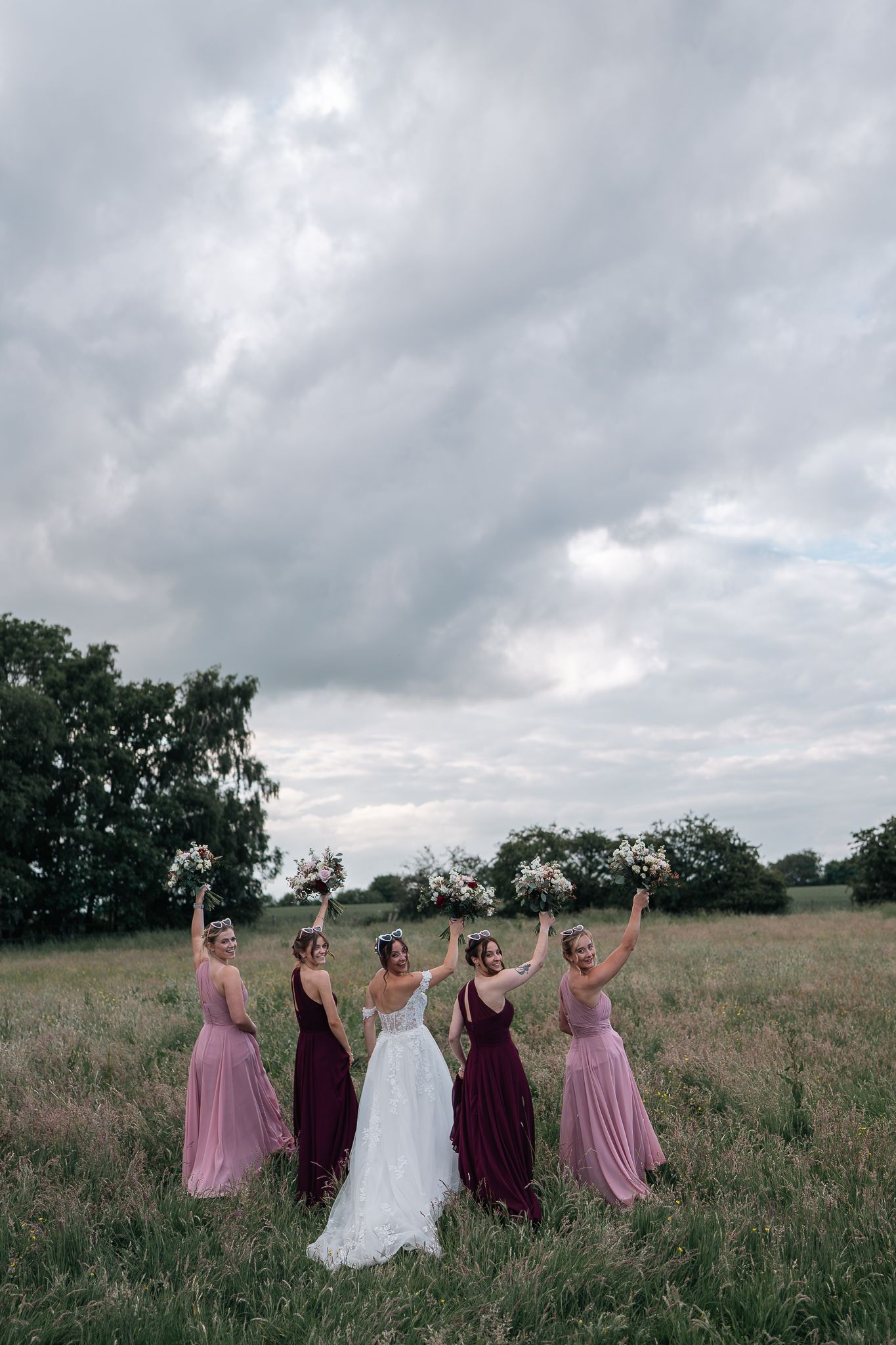 Bride and her bridesmaids during the reception at The barn at Willerby, East Yorkshire, Taken by an East Yorkshire wedding photographer