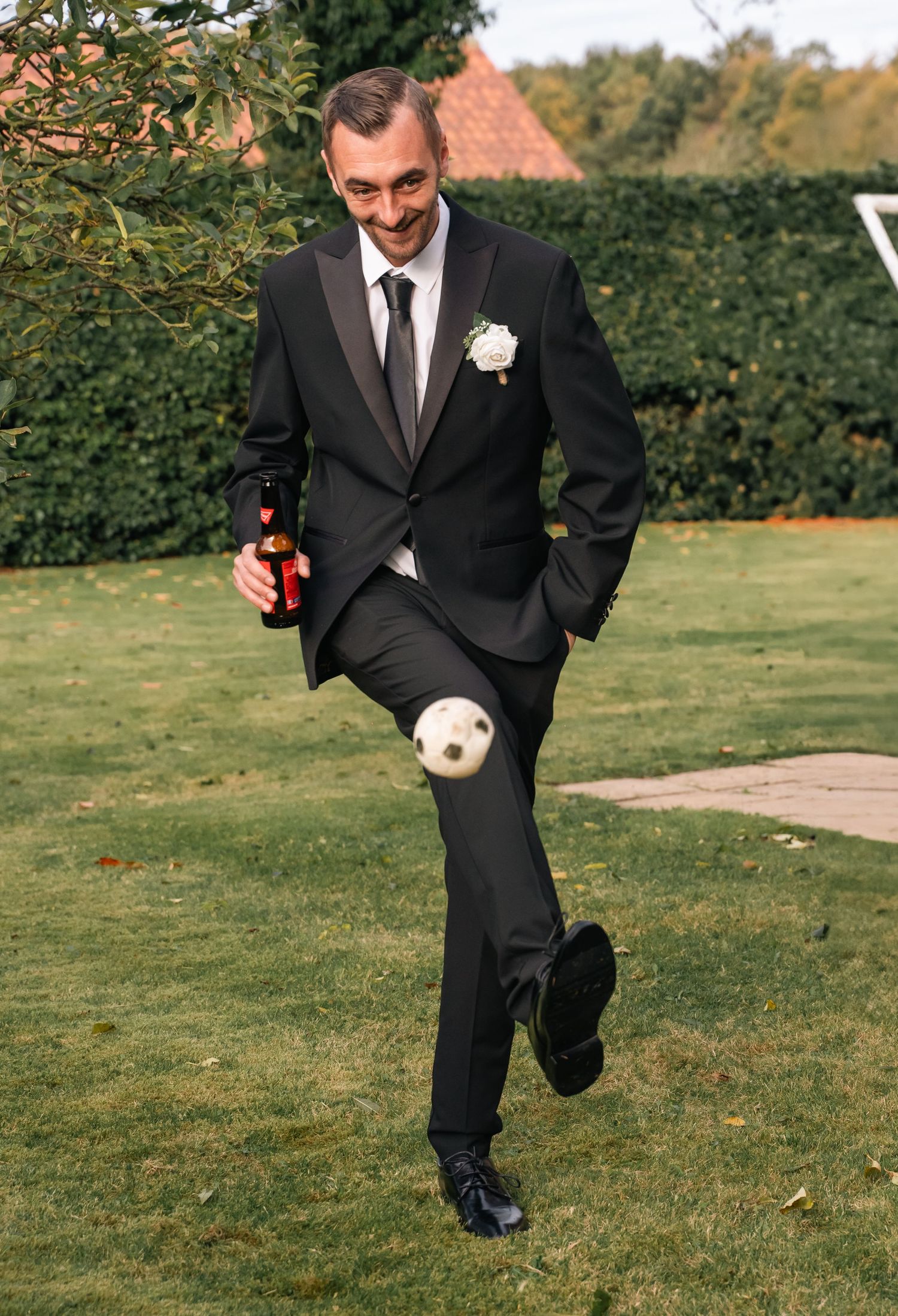 Groomsmen having a kick about during the preparations in East Yorkshire