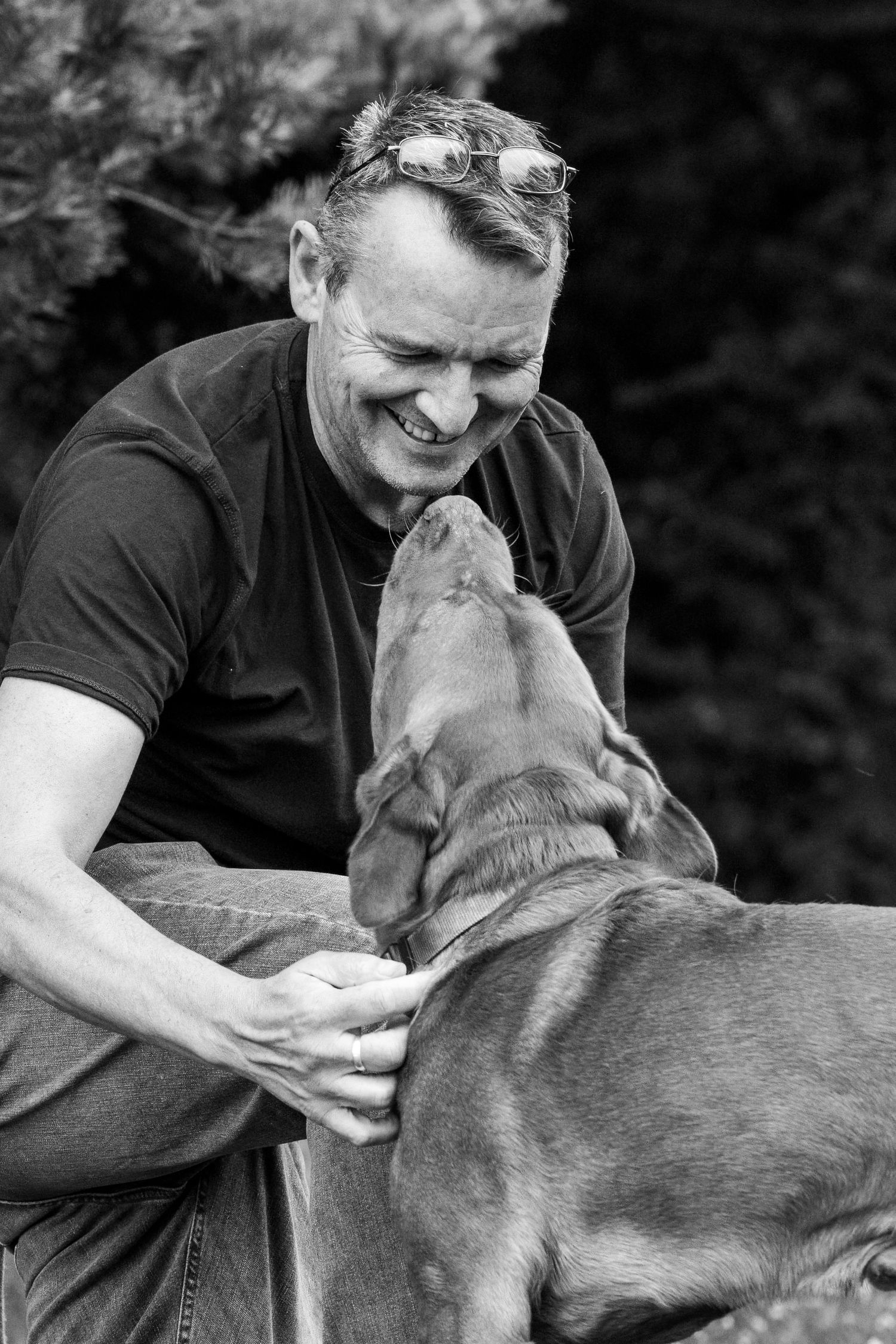 Dog and owner portrait outdoors.