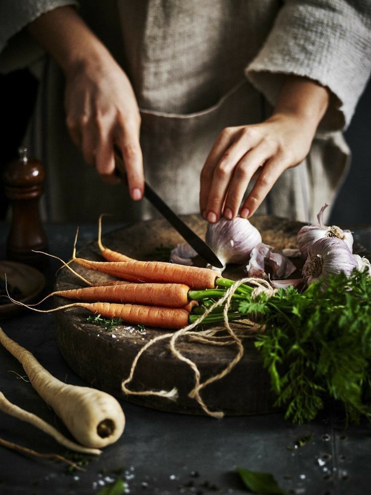 Chopping vegetables. Meal preparation or batch cooking services in Canberra.