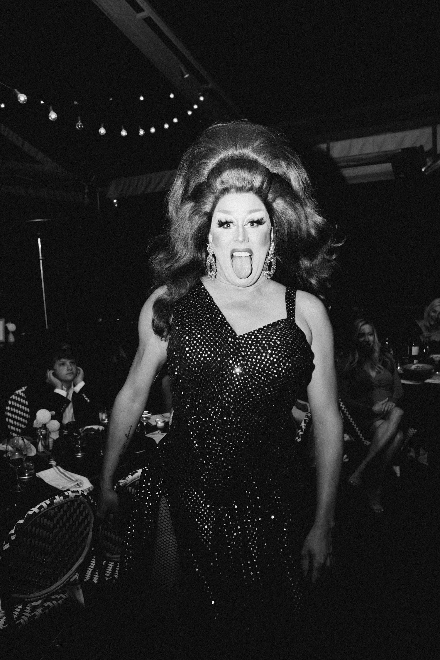 Documentary wedding reception portrait of a guest dancing