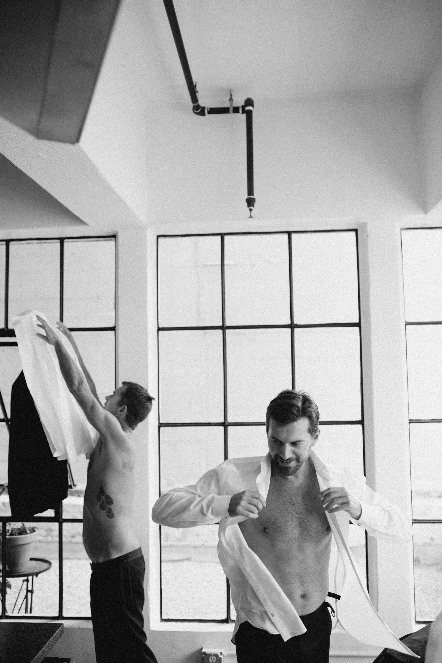 Candid wedding day preparation moment captured indoors