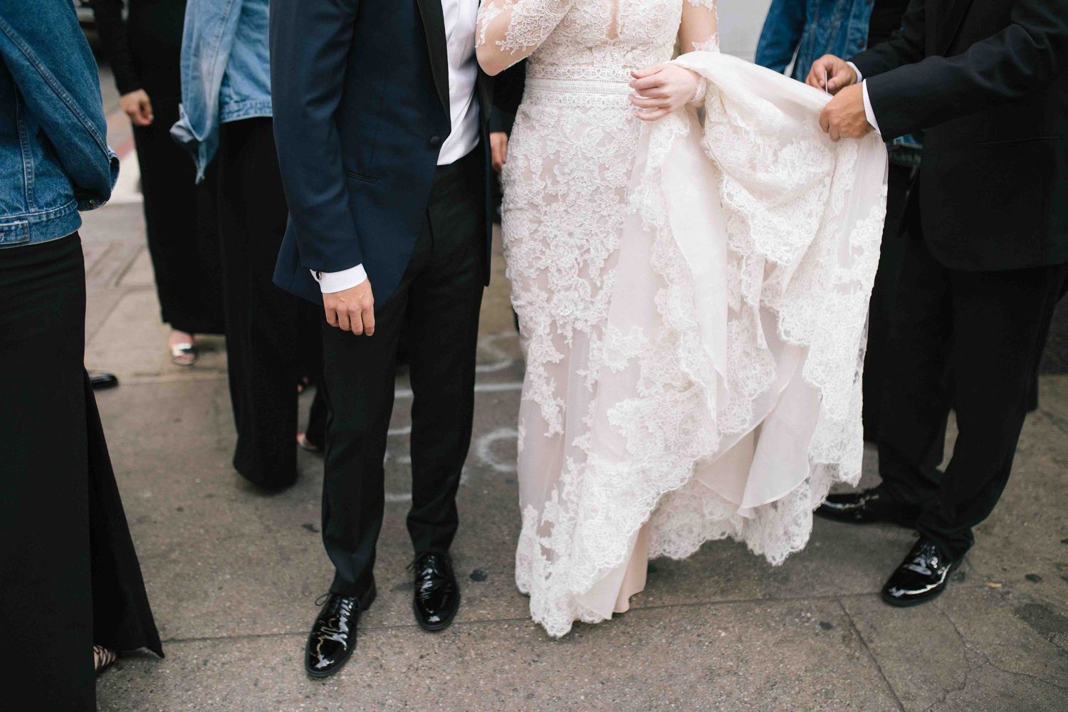 Unscripted moment showing wedding attire and movement during the day