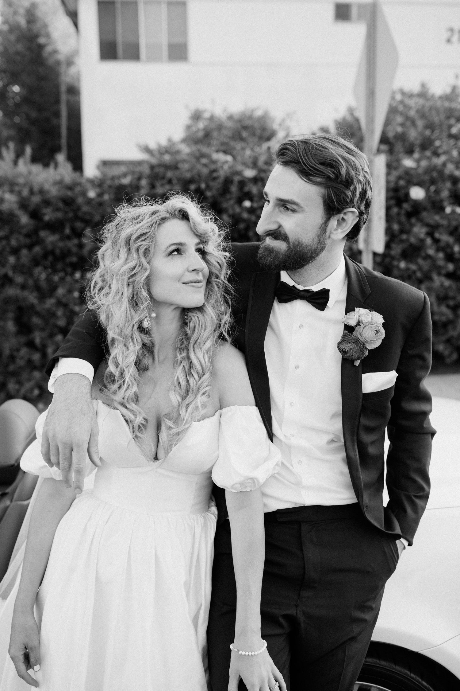Candid moment of a bride and groom enjoying peaceful moment after the reception