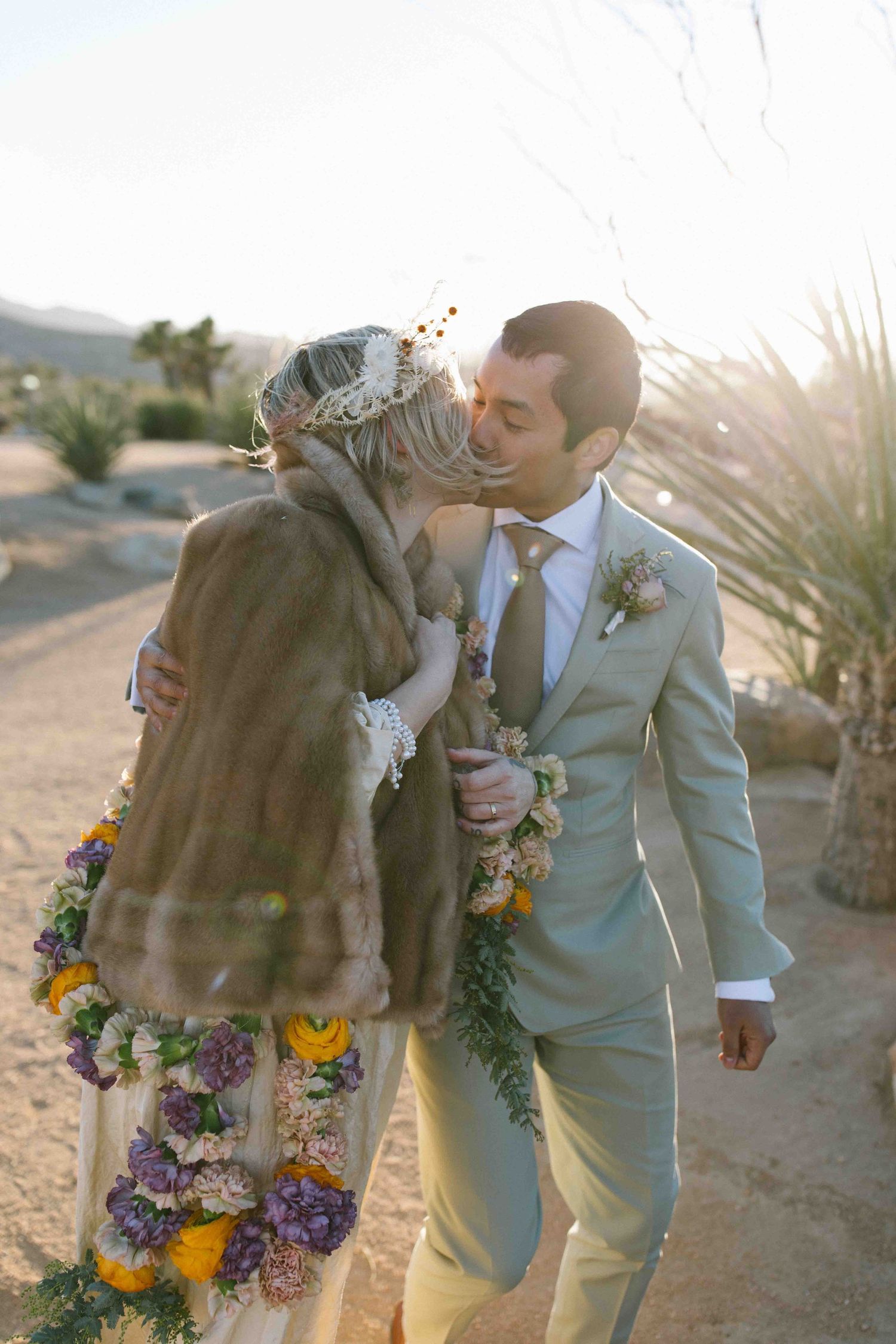 Bride and groom sharing a quiet moment together at sunset