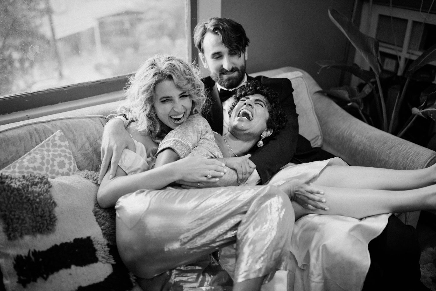Quiet candid moment of guest resting together during wedding day