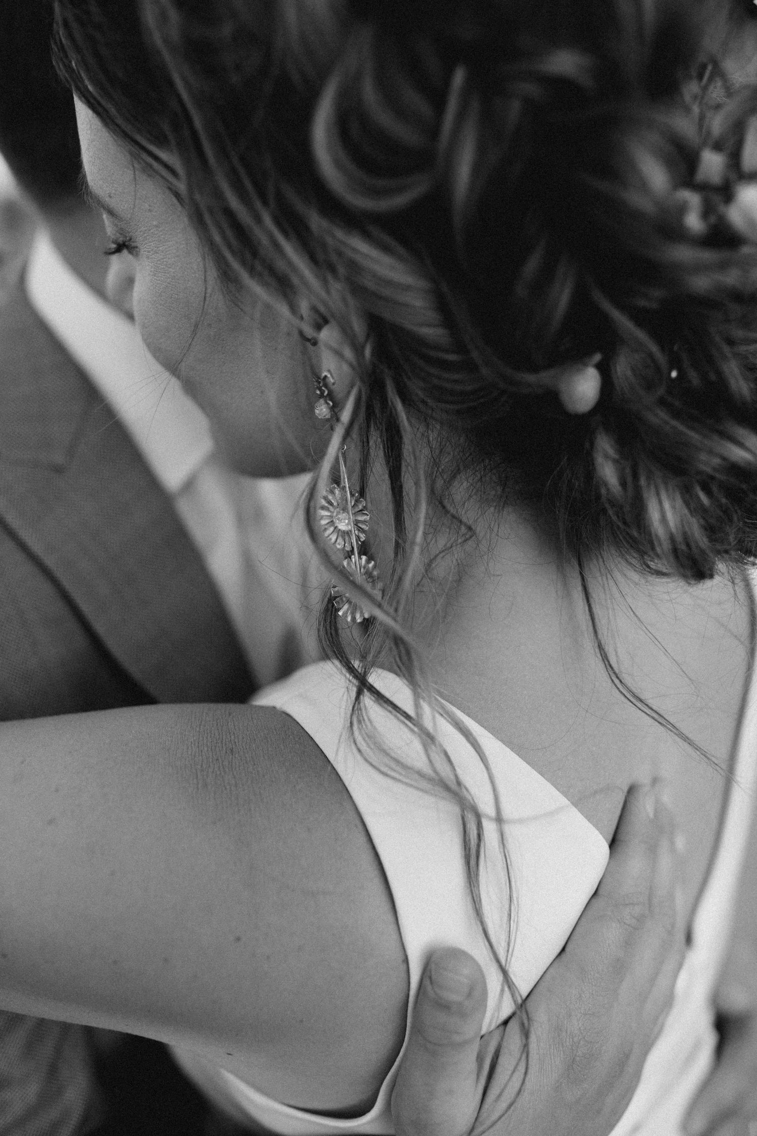 Intimate documentary close-up of a bride during quiet wedding day moments