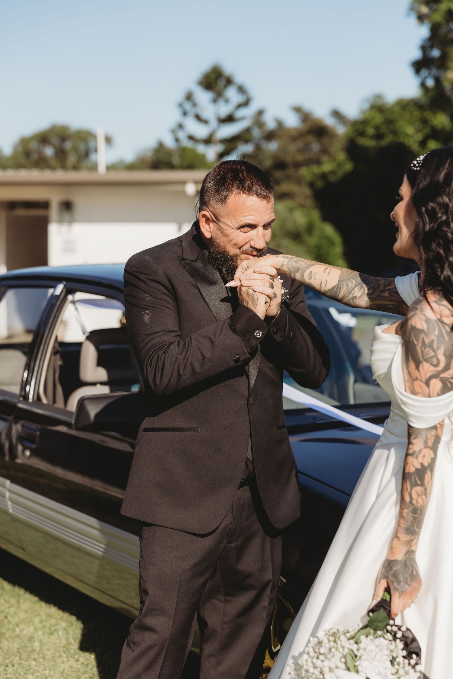 A sequence of emotional first look photos between a couple during their outdoor wedding.