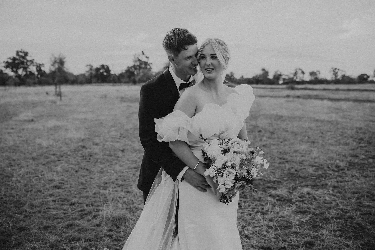 Artistic wedding photo series showing couple's romantic interaction in natural outdoor setting.