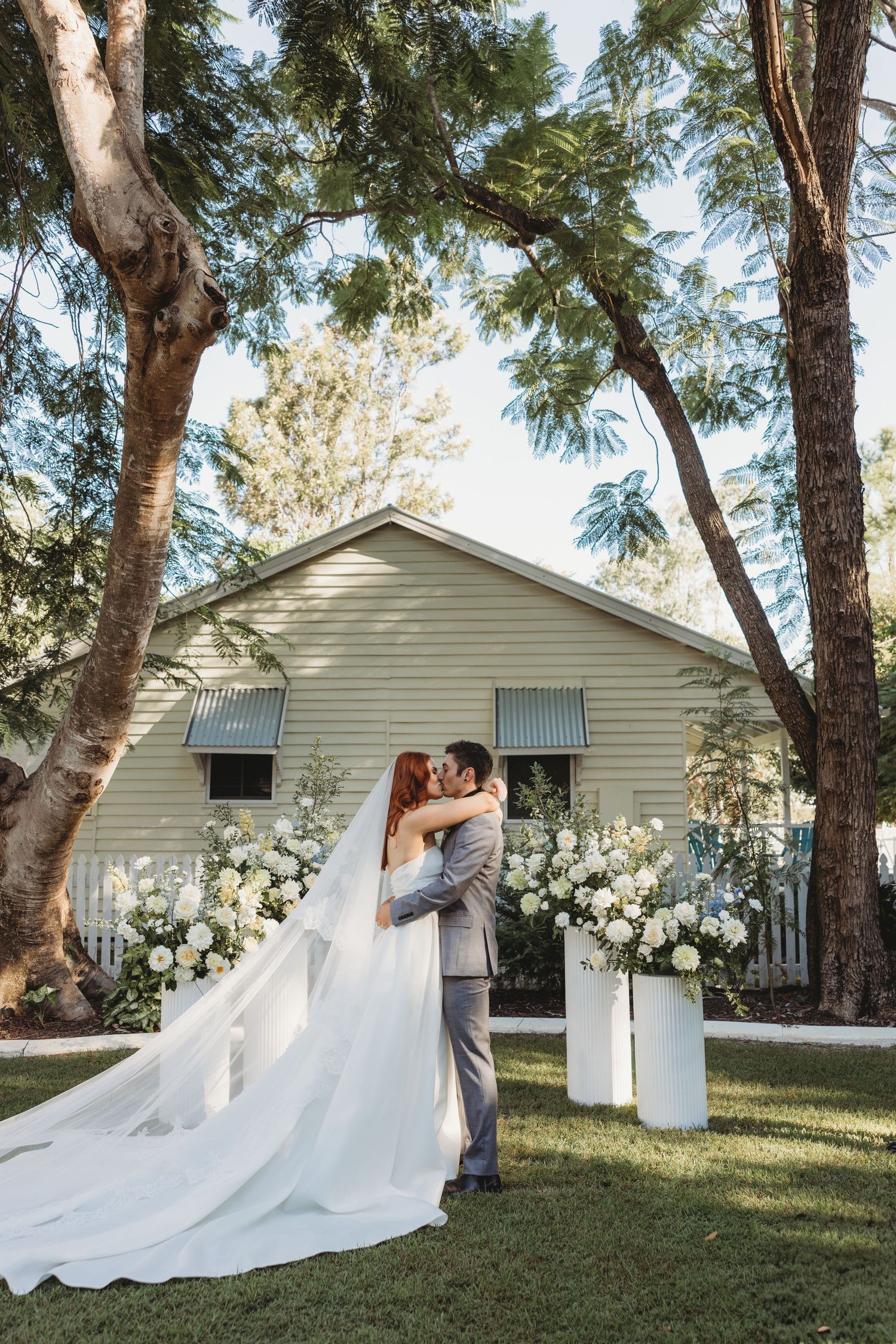 first kiss as husband and wife St Aubins Village Rockhampton