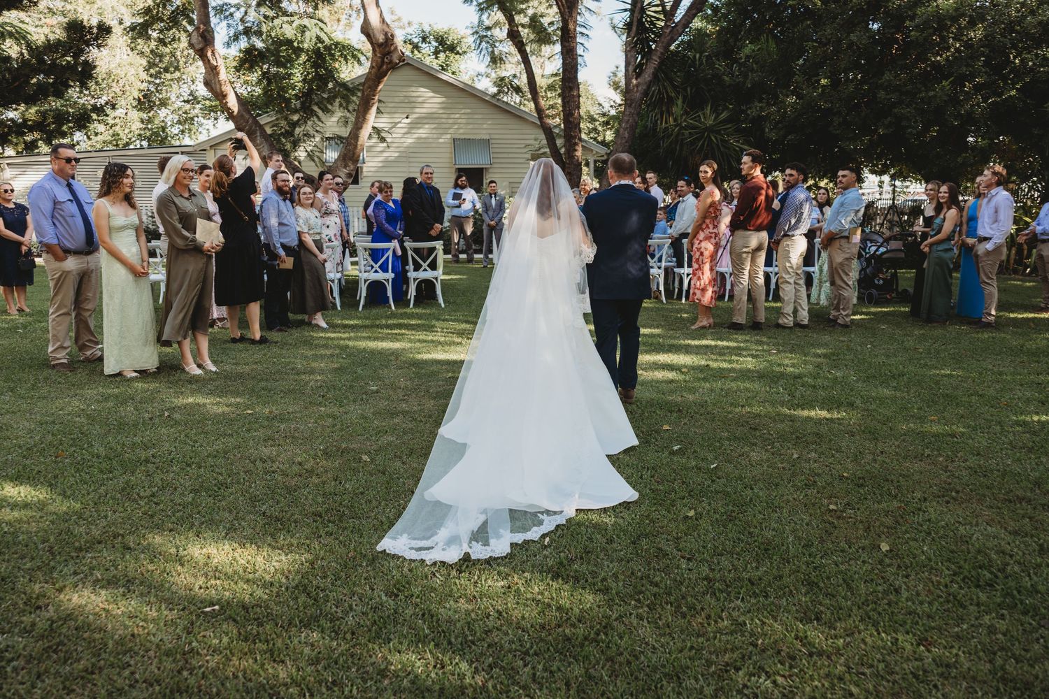 bride walking down aisle emotional ceremony St Aubins Village