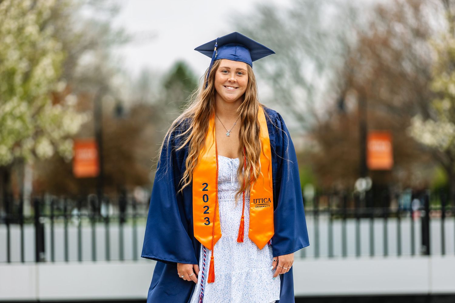 Girl wearing graduation cap and gown