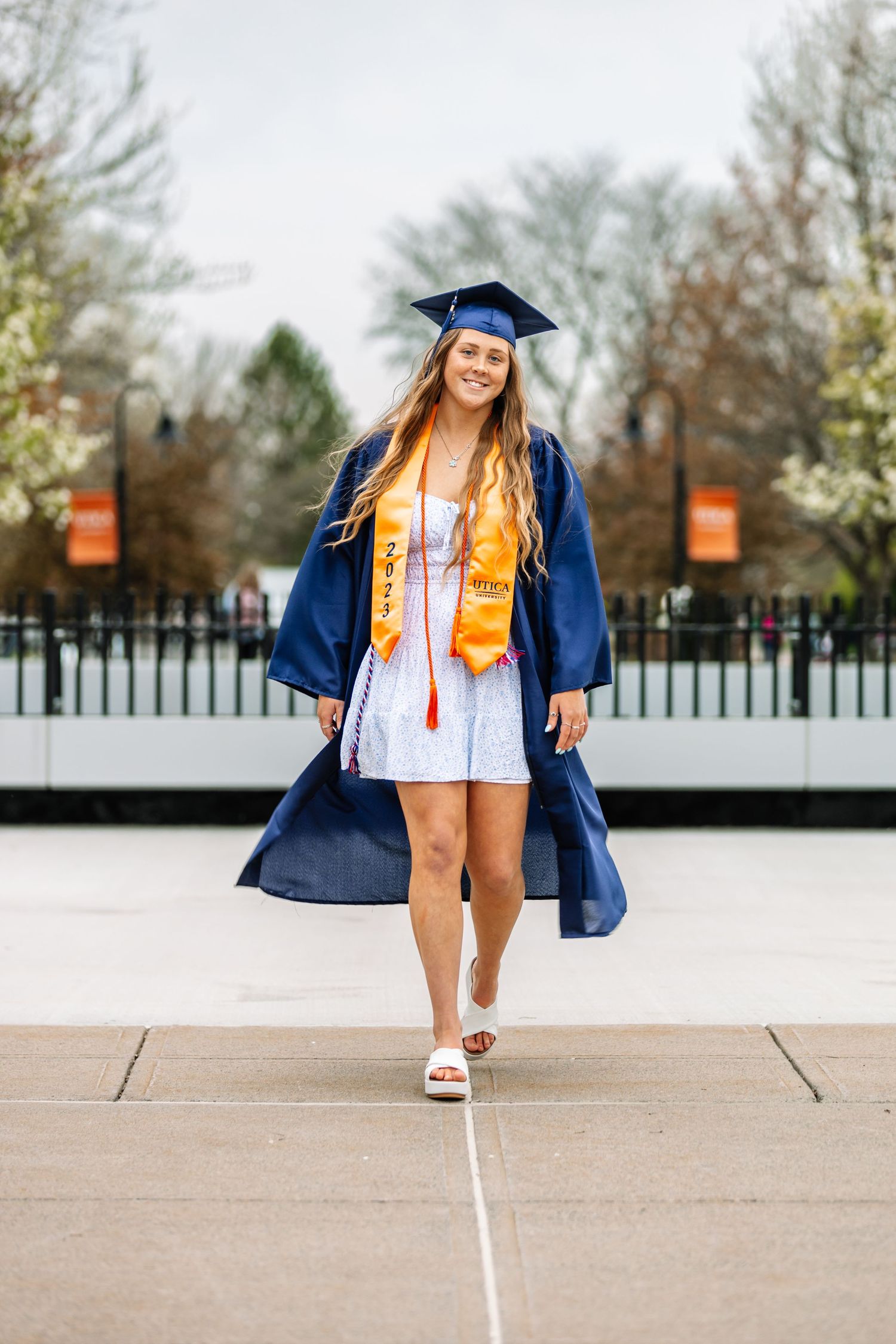 Girl wearing graduation cap and gown