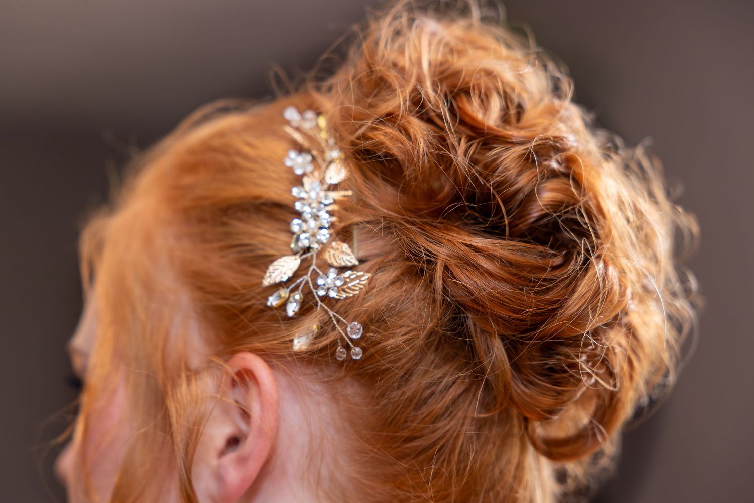 Close-up of elegant bridal hair accessories and styling.