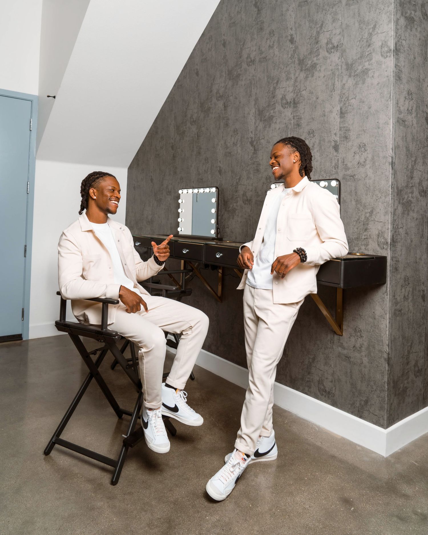 Digital self-portrait composite of Isaiah Everett in studio laughing during branding shoot, reflecting collaboration and confidence.