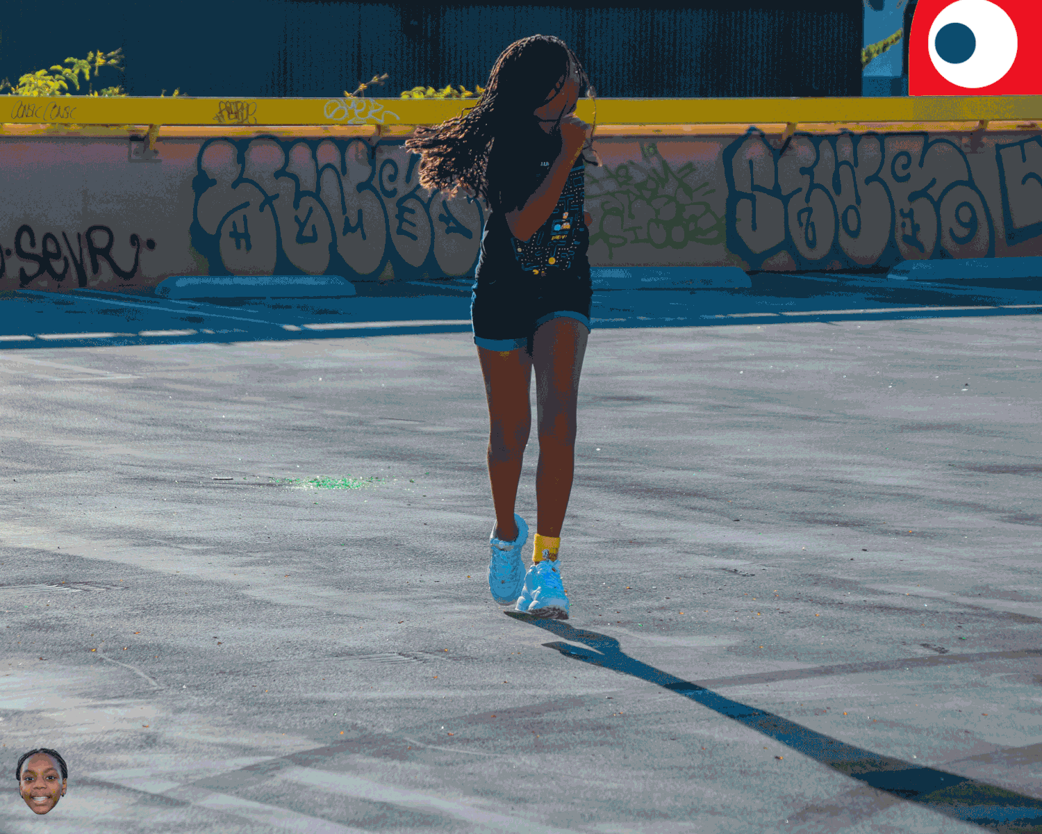 GIF of young girl running away from Pacman ghost.