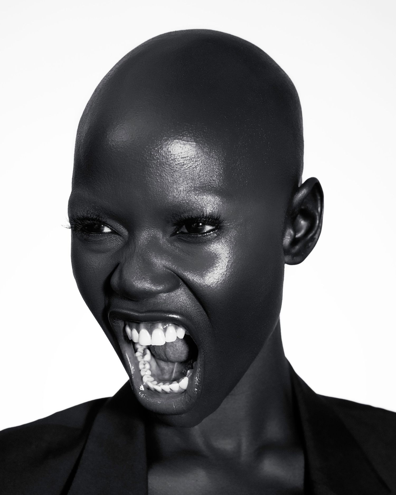Close-up black and white portraits showcasing dynamic facial expressions.