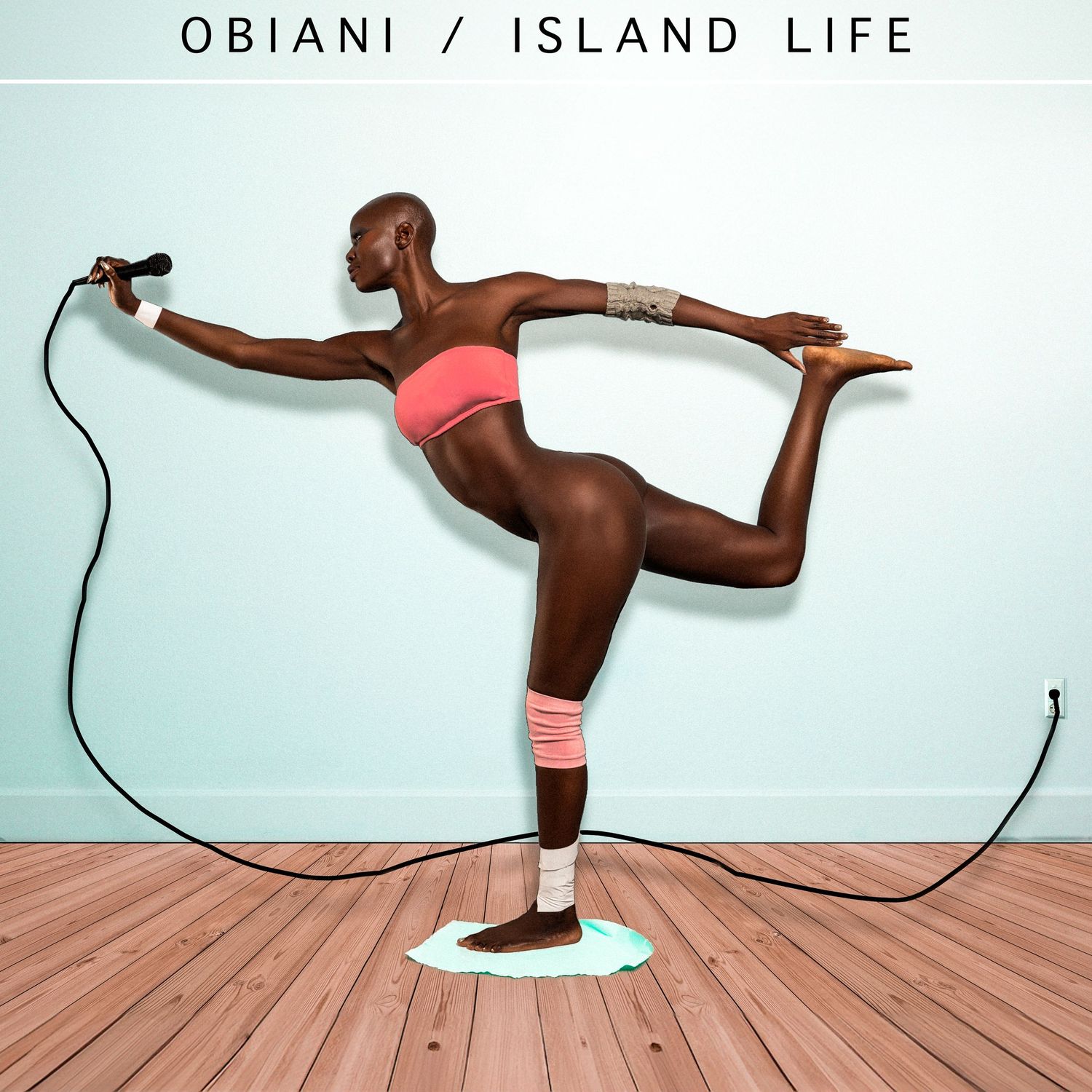 Dance sequence showing balance and movement against white background with Obiani Island Life text.