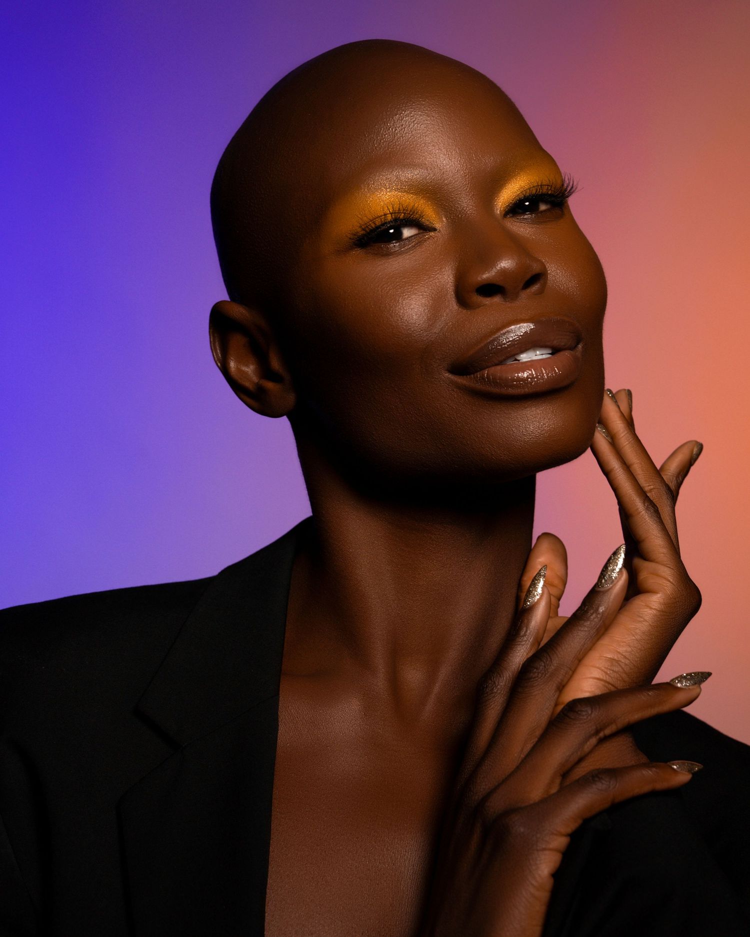 Elegant portrait series with warm lighting and thoughtful poses.