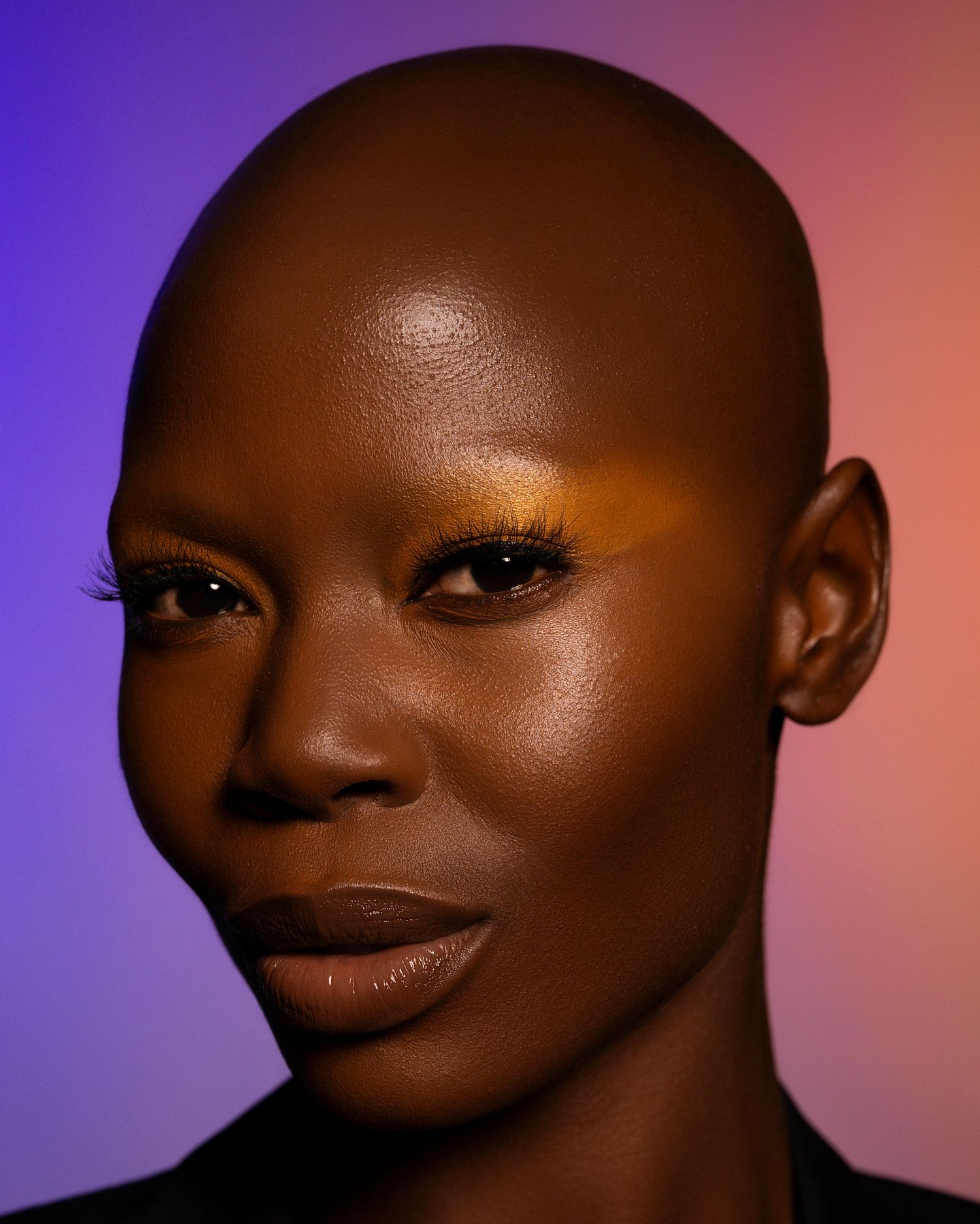 Close-up beauty portraits showing different expressions and angles with dramatic lighting against a purple-orange backdrop.