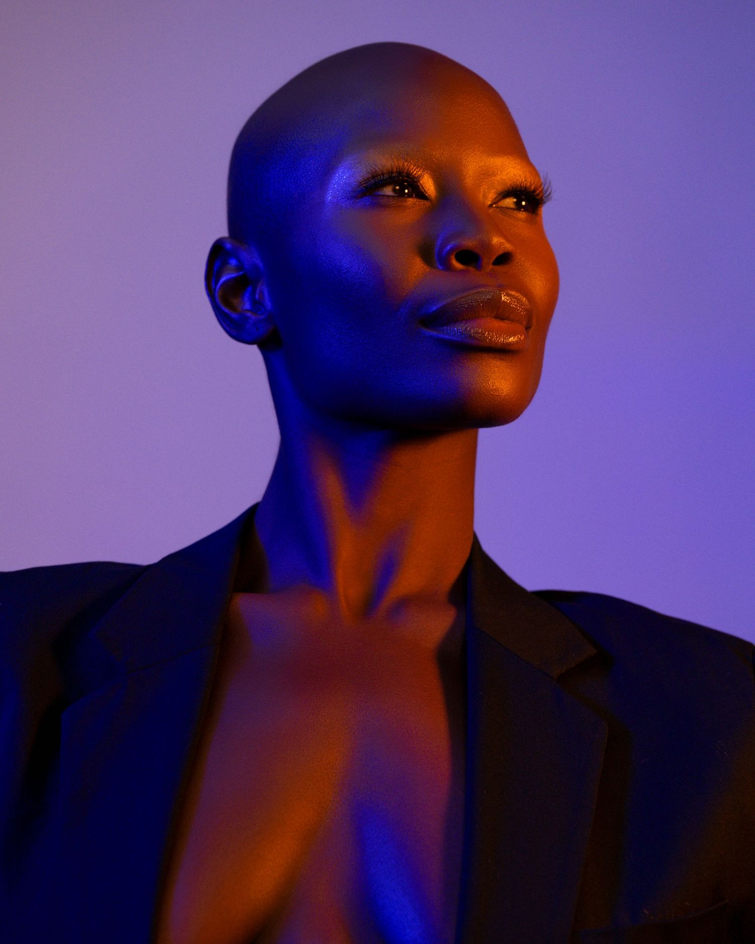 Portrait series with blue lighting effects creating a mysterious atmosphere.