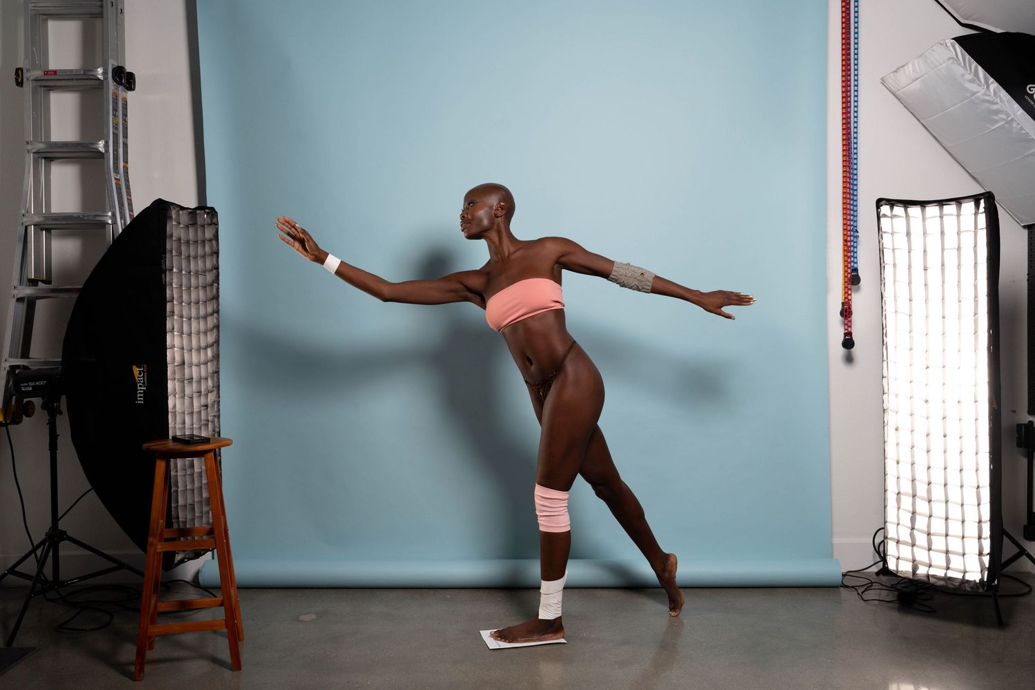 Artistic dance performance sequence showing balance and form in studio setting.