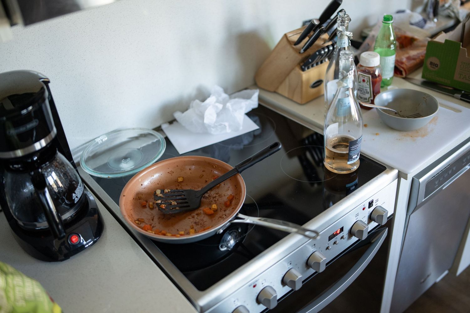 Coffee brewing equipment and supplies arranged on a kitchen counter.