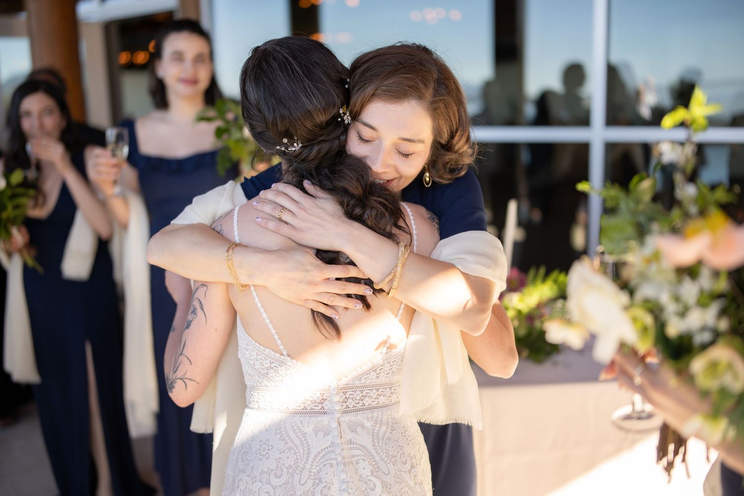 Wedding celebration candid moments captured during an outdoor evening reception.