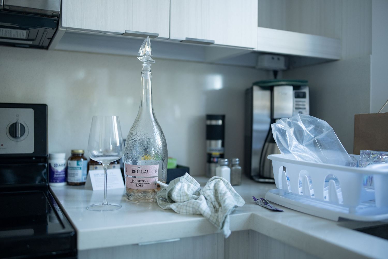 Clean modern kitchen counter with laboratory glassware and supplies.