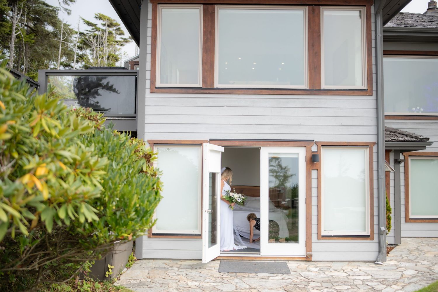 Modern architectural details of a wedding venue with large windows and trim.