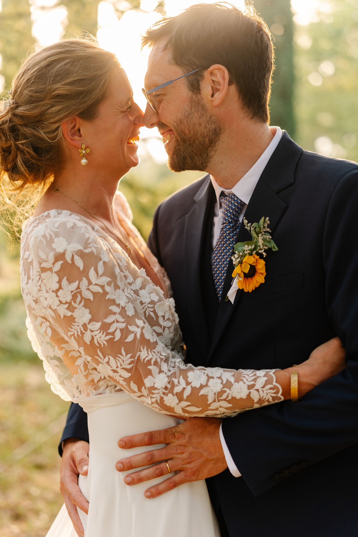 A romantic wedding couple embraces during golden hour in a series of three intimate outdoor portraits.