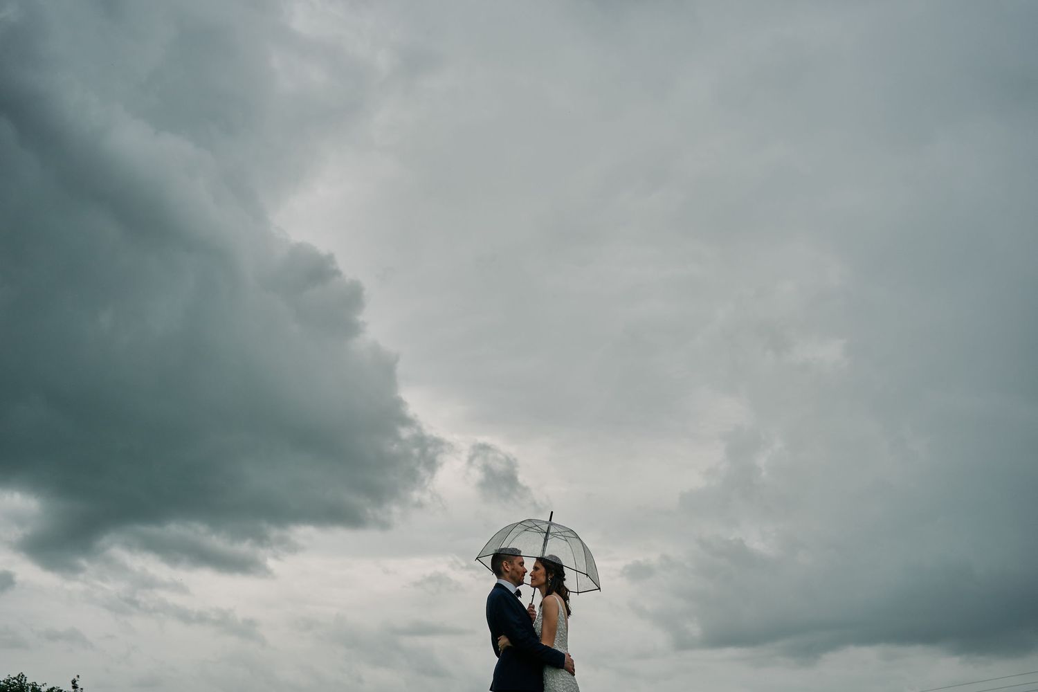 A series of dramatic cloudy skyscapes with stormy weather patterns shown in a panoramic collage format.