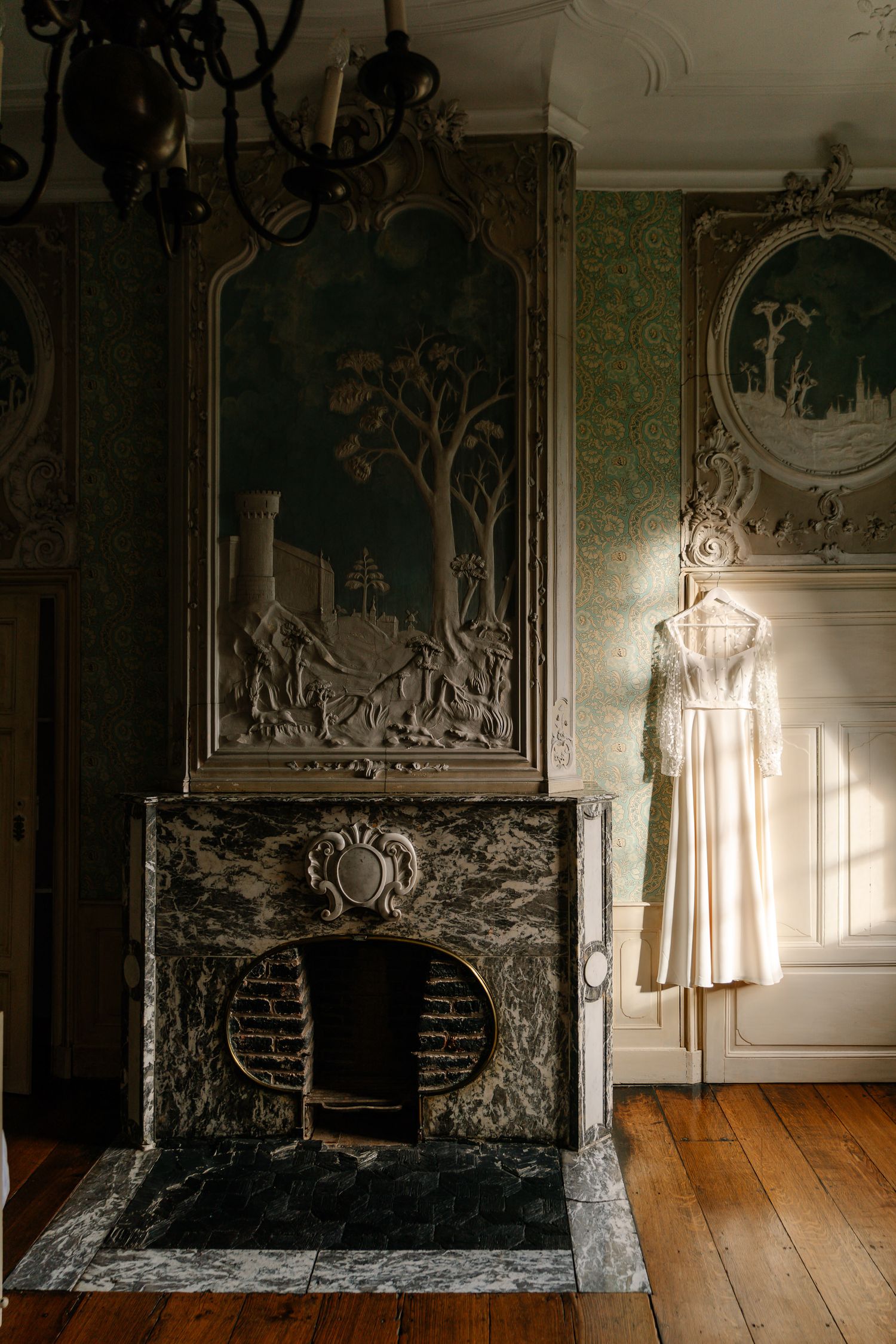 A series of photos showing an ornate vintage fireplace with carved stone details and wooden flooring in a historic room.